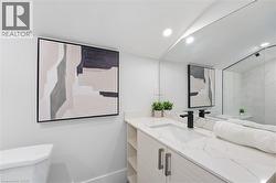 Bathroom with vanity and recessed lighting - 