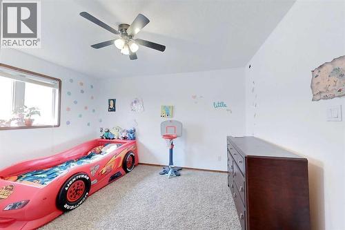 23 Springwood Drive Ne, Slave Lake, AB - Indoor Photo Showing Bedroom