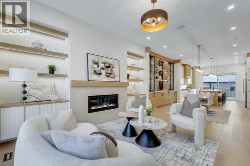 629 21 Avenue Nw, Calgary, AB - Indoor Photo Showing Living Room With Fireplace