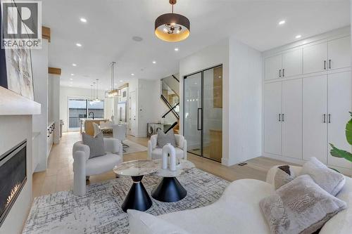 629 21 Avenue Nw, Calgary, AB - Indoor Photo Showing Living Room With Fireplace