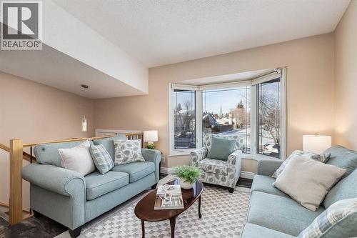 1205 Meadowbrook Drive Se, Airdrie, AB - Indoor Photo Showing Living Room