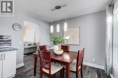 1205 Meadowbrook Drive Se, Airdrie, AB - Indoor Photo Showing Dining Room