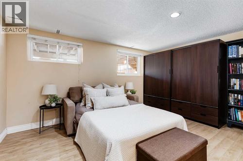 Bedroom 5 - 1205 Meadowbrook Drive Se, Airdrie, AB - Indoor Photo Showing Bedroom