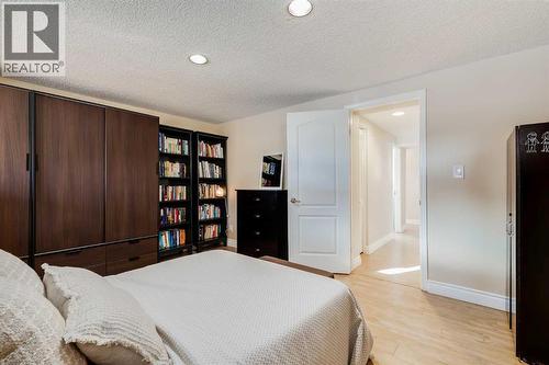 1205 Meadowbrook Drive Se, Airdrie, AB - Indoor Photo Showing Bedroom