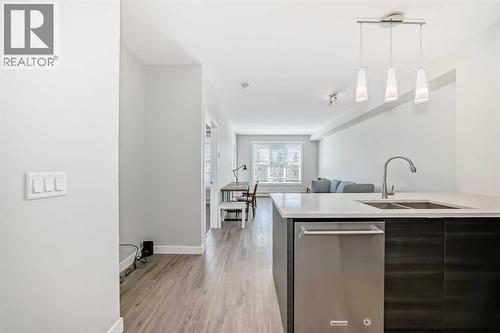 3210, 95 Burma Star Road Sw, Calgary, AB - Indoor Photo Showing Kitchen With Double Sink