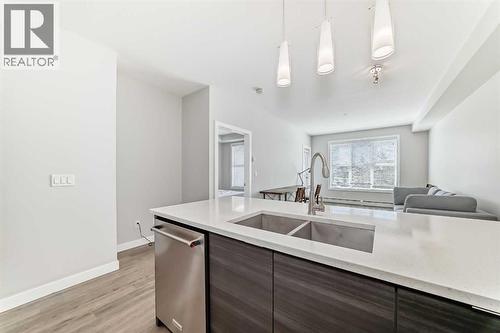 3210, 95 Burma Star Road Sw, Calgary, AB - Indoor Photo Showing Kitchen With Double Sink