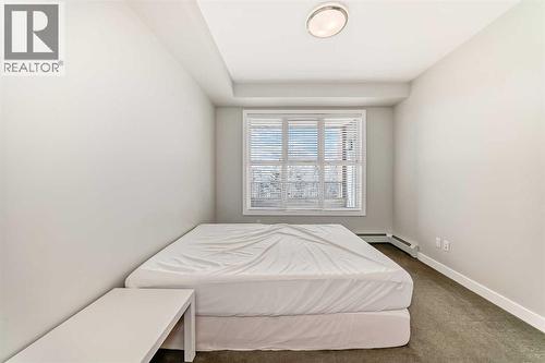 3210, 95 Burma Star Road Sw, Calgary, AB - Indoor Photo Showing Bedroom