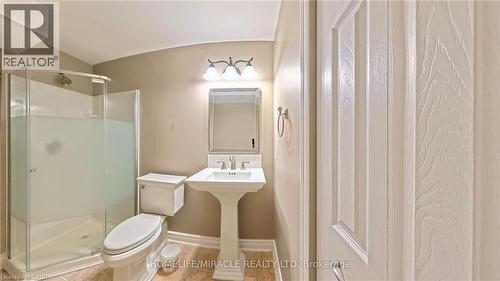 Bathroom with toilet and a shower stall - 919 Zeller Crescent, Kitchener, ON - Indoor Photo Showing Bathroom