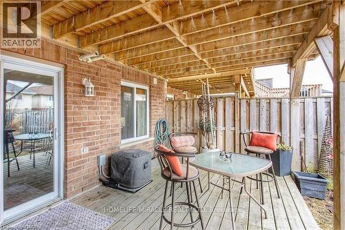 Wooden deck with outdoor dining area - 919 Zeller Crescent, Kitchener, ON - Outdoor With Deck Patio Veranda With Exterior