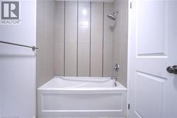 Bathroom featuring shower / bath combination - 