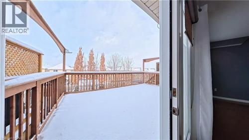 View of snow covered deck - 919 Zeller Crescent, Kitchener, ON - Outdoor With Exterior