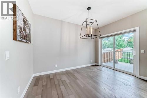 41 Shawnee Green Sw, Calgary, AB - Indoor Photo Showing Other Room