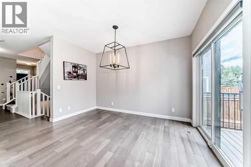 41 Shawnee Green Sw, Calgary, AB - Indoor Photo Showing Other Room