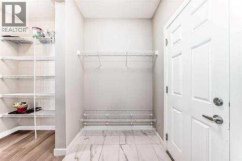 41 Shawnee Green Sw, Calgary, AB - Indoor Photo Showing Other Room