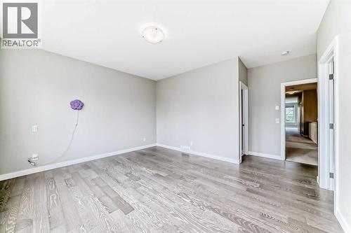 41 Shawnee Green Sw, Calgary, AB - Indoor Photo Showing Other Room