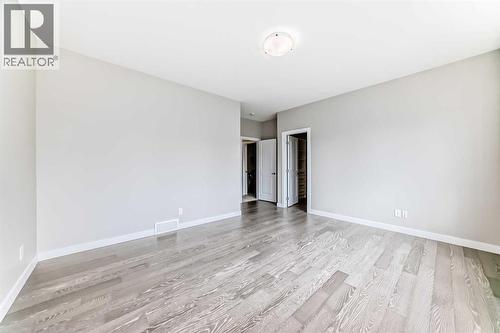 41 Shawnee Green Sw, Calgary, AB - Indoor Photo Showing Other Room