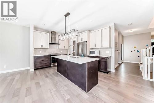 41 Shawnee Green Sw, Calgary, AB - Indoor Photo Showing Kitchen With Stainless Steel Kitchen With Upgraded Kitchen