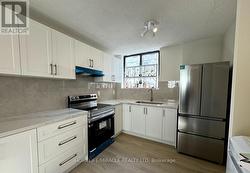 303 - 665 KENNEDY ROAD  Toronto, ON M1K 5E2