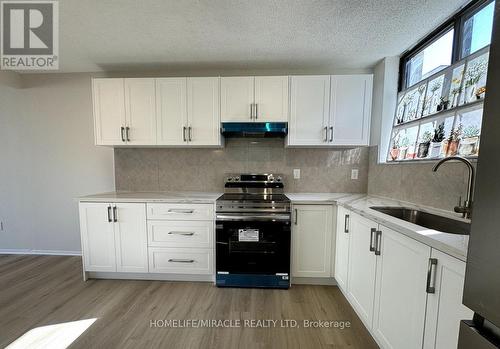 303 - 665 Kennedy Road, Toronto, ON - Indoor Photo Showing Kitchen