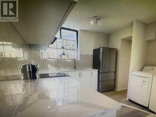 303 - 665 Kennedy Road, Toronto, ON - Indoor Photo Showing Laundry Room