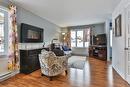 Salon - 190 Rue Des Échevins, Saint-Jean-Sur-Richelieu, QC  - Indoor Photo Showing Living Room With Fireplace 