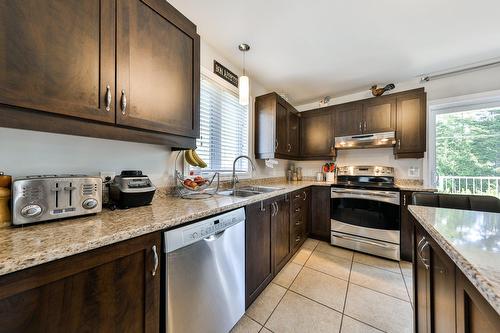 Logement - 156  - 160 Rue Marie-Chapleau, Blainville, QC - Indoor Photo Showing Kitchen With Double Sink