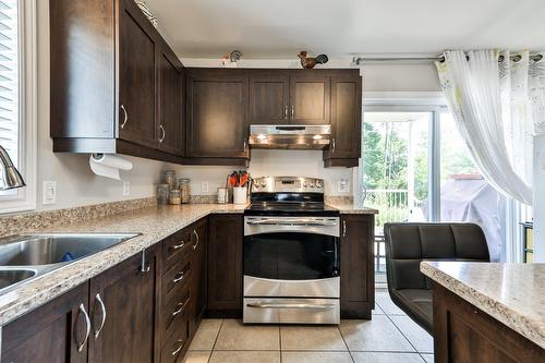 Logement - 156  - 160 Rue Marie-Chapleau, Blainville, QC - Indoor Photo Showing Kitchen With Double Sink