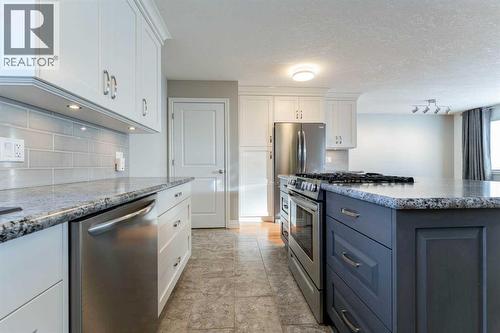 640 54 Avenue W, Claresholm, AB - Indoor Photo Showing Kitchen With Upgraded Kitchen