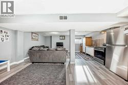 Living and kitchen area of Legal 1 BR Suite - 