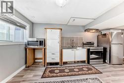 Kitchen of Legal 1 BR Suite - 