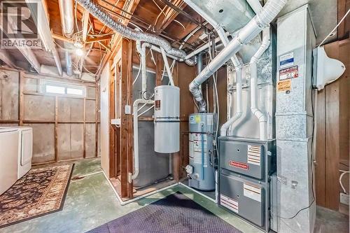 Mechanicals - 216 Pinecrest Crescent Ne, Calgary, AB - Indoor Photo Showing Basement