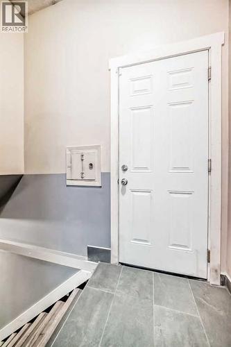 Separate Entry for Legal Suite that leads to the backyard - 216 Pinecrest Crescent Ne, Calgary, AB - Indoor Photo Showing Other Room