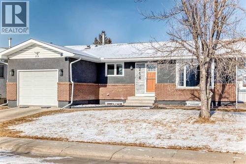Landscaped with driveway and street parking - 216 Pinecrest Crescent Ne, Calgary, AB - Outdoor