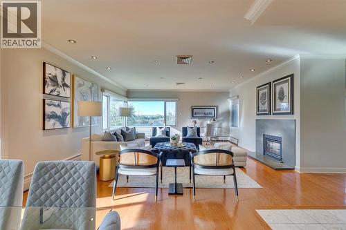 3N, 222 Eagle Ridge Drive Sw, Calgary, AB - Indoor Photo Showing Living Room With Fireplace