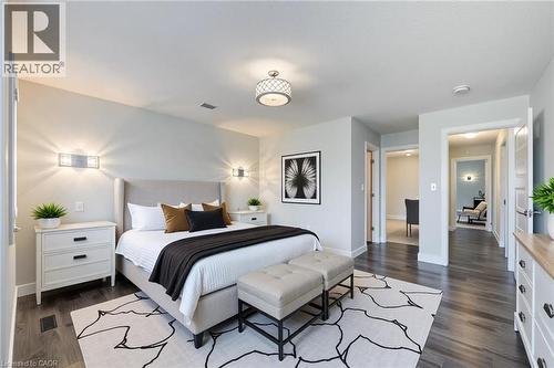 Bedroom featuring dark wood-style floors - 2527 Holbrook Drive, London, ON - Indoor Photo Showing Bedroom