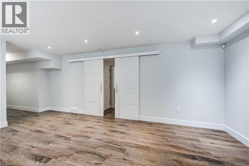 Below grade area featuring recessed lighting and light wood-style floors - 2527 Holbrook Drive, London, ON - Indoor Photo Showing Other Room