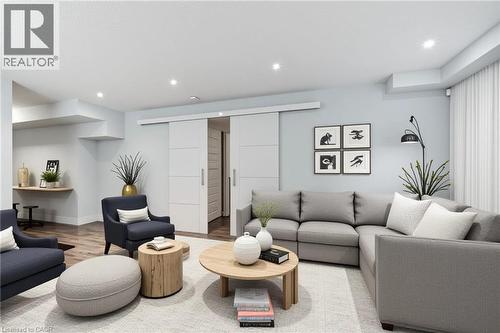 Living area with wood finished floors and recessed lighting - 2527 Holbrook Drive, London, ON - Indoor Photo Showing Living Room