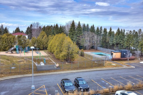 Stationnement - 306-3499 Av. Jacques-Bureau, Laval (Chomedey), QC - Outdoor With In Ground Pool With View