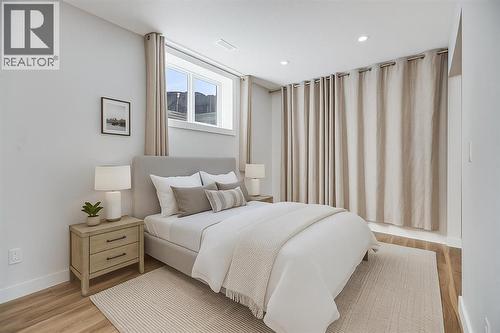 107 Wood Valley Drive Sw, Calgary, AB - Indoor Photo Showing Bedroom