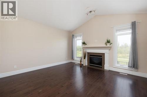 353 Walnut Crescent, Fort Mcmurray, AB - Indoor Photo Showing Living Room With Fireplace