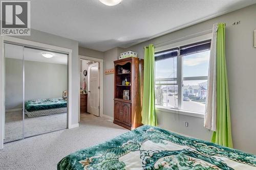 43 Sunrise Crescent Ne, High River, AB - Indoor Photo Showing Bedroom