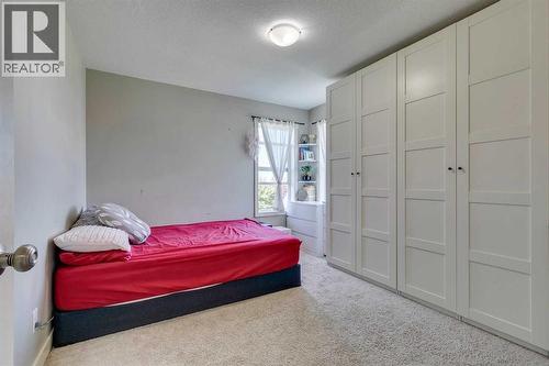 43 Sunrise Crescent Ne, High River, AB - Indoor Photo Showing Bedroom