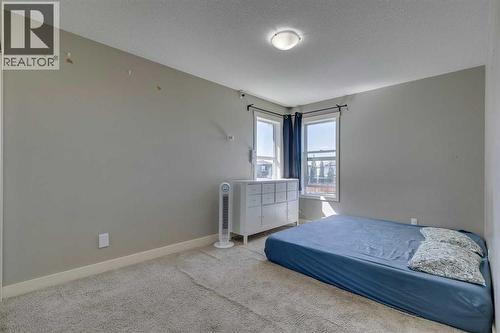 43 Sunrise Crescent Ne, High River, AB - Indoor Photo Showing Bedroom