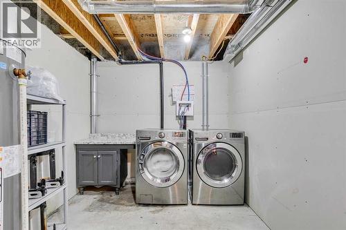 43 Sunrise Crescent Ne, High River, AB - Indoor Photo Showing Laundry Room