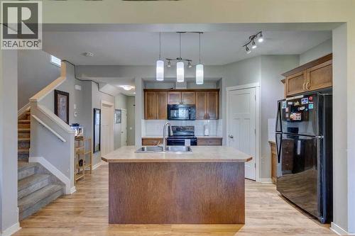 43 Sunrise Crescent Ne, High River, AB - Indoor Photo Showing Kitchen
