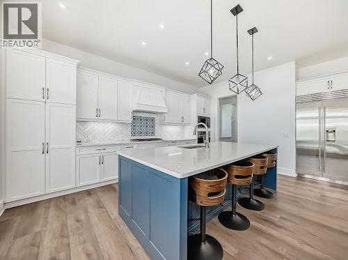60 Junegrass Terrace, Rural Rocky View County, AB - Indoor Photo Showing Kitchen With Upgraded Kitchen