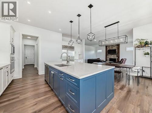 60 Junegrass Terrace, Rural Rocky View County, AB - Indoor Photo Showing Kitchen With Upgraded Kitchen