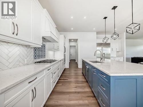 60 Junegrass Terrace, Rural Rocky View County, AB - Indoor Photo Showing Kitchen With Upgraded Kitchen