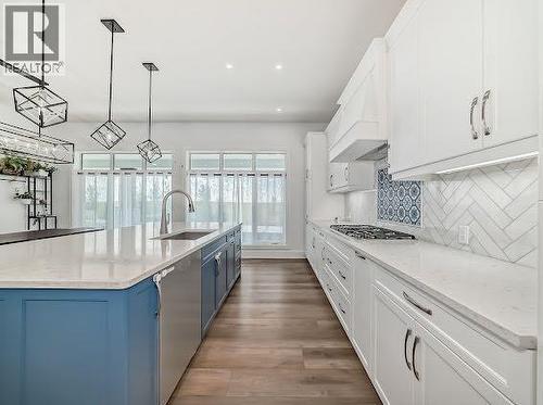 60 Junegrass Terrace, Rural Rocky View County, AB - Indoor Photo Showing Kitchen With Upgraded Kitchen