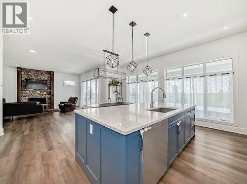 60 Junegrass Terrace, Rural Rocky View County, AB - Indoor Photo Showing Kitchen With Upgraded Kitchen